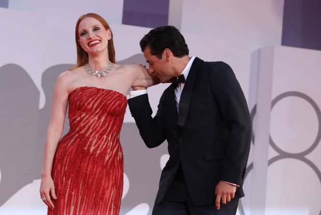 A photo of Chastain and Isaac’s steamy moment at the Venice Film Festival in September 2021.