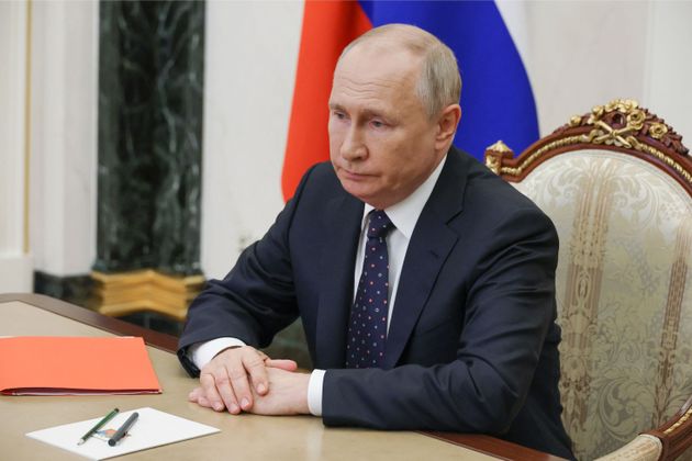 In this pool photograph distributed by Russian state owned agency President Vladimir Putin chairs a meeting with Security Council permanent members via video link in Moscow, on August 25, 2023.